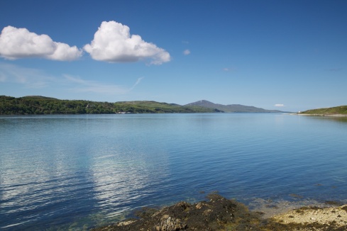 Work is definitely overrated!  But, to be fair, on Monday the weather was beautiful and the scenery magnificent.  It would have required more talent than I possess to take bad photos.  This was taken just down the road from the ferry ramp on Jura looking towards Port Askaig on Islay.